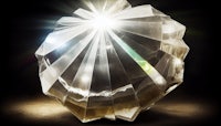 a large crystal with a light shining through it